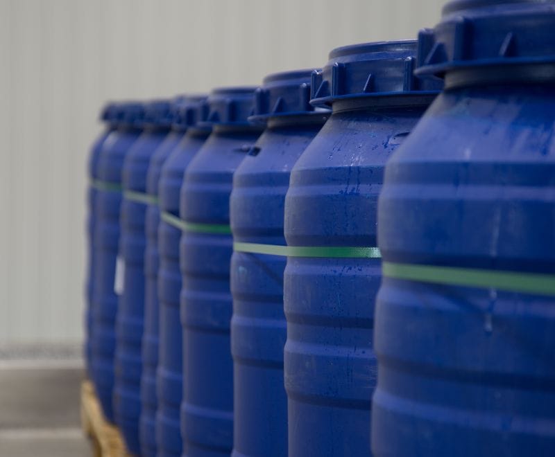 Blue export barrels in the Zeewolde warehouse