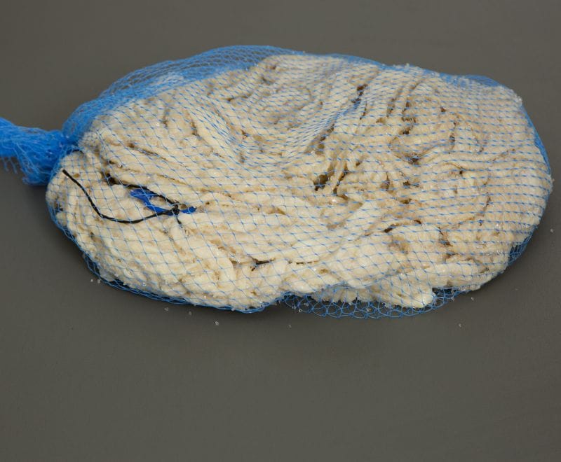 Salted natural beef rounds in a net