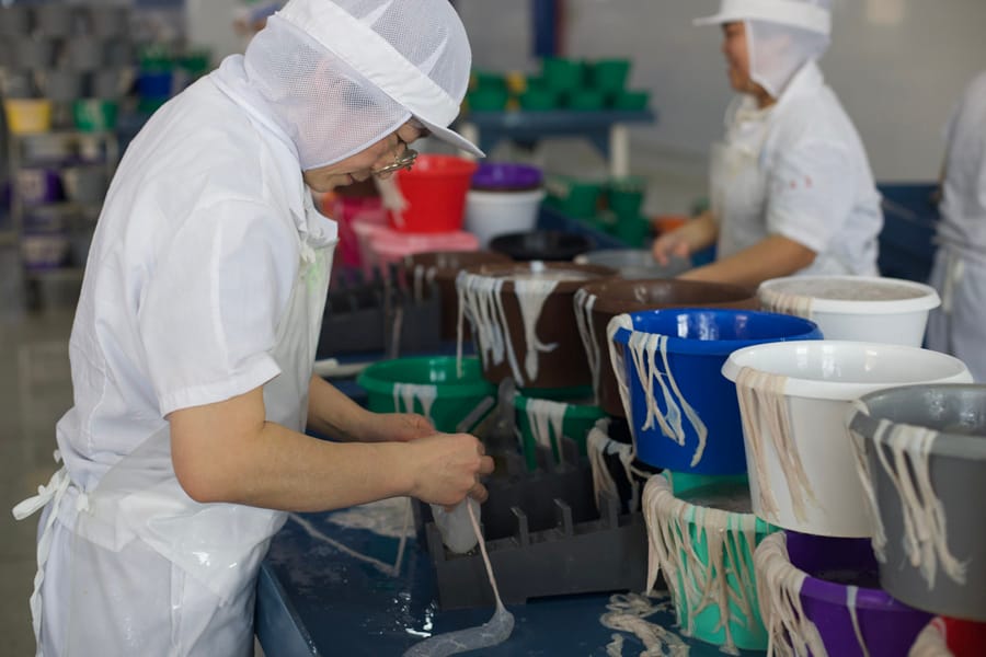 Operator shirring casings onto soft tubes