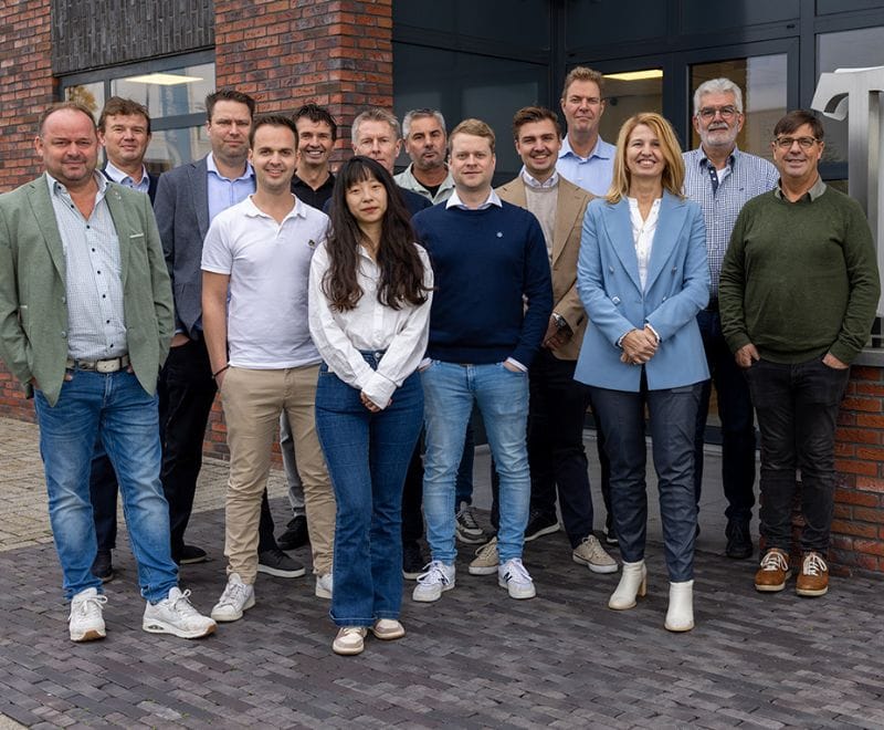 The Teijsen team in front of the building