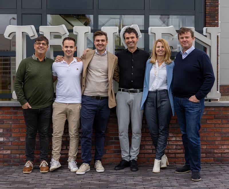 Team members under the Teijsen letters in Zeewolde